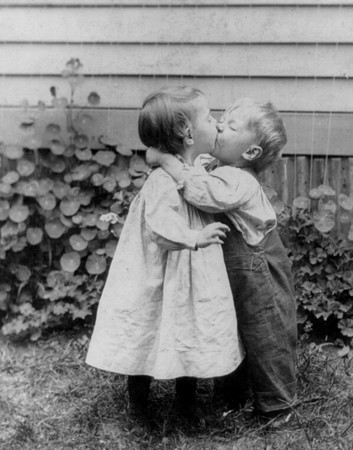 girl and boy kissing engraving
